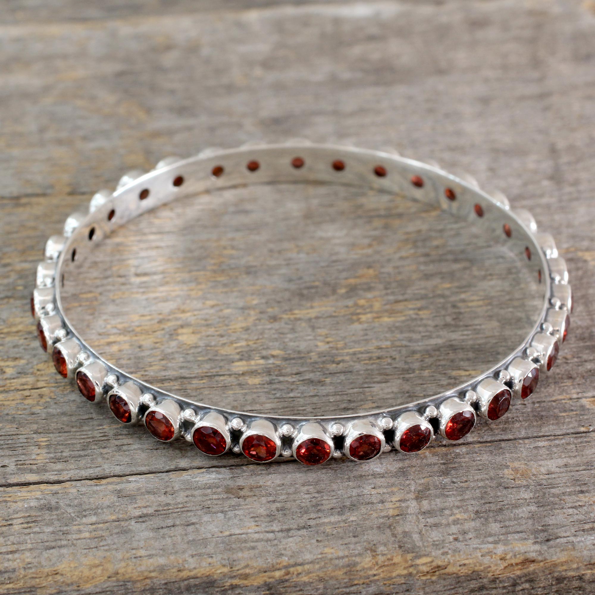 15-carat Garnet Fair Trade Silver Bangle Bracelet from India, 'Love's Energy' sterling silver NOVICA