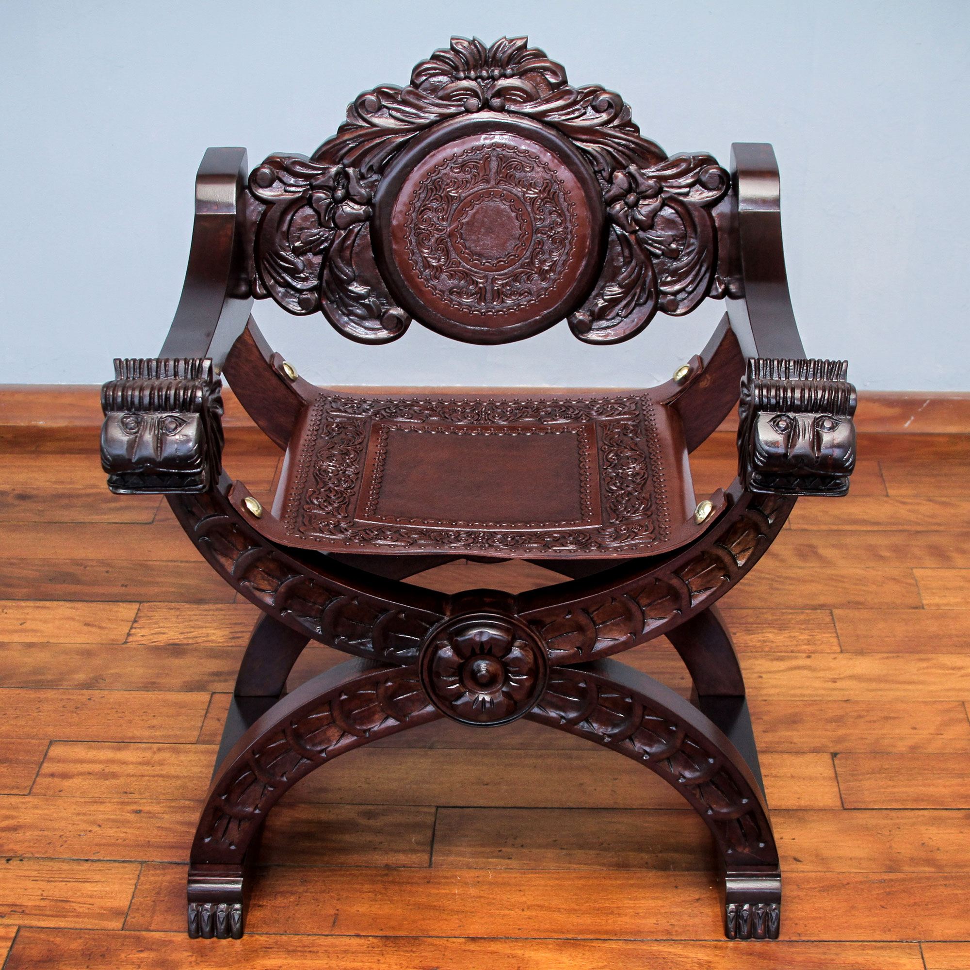 Cedar and leather chair, 'Lion's Head' hand carved wood tooled embossed leather upholstery