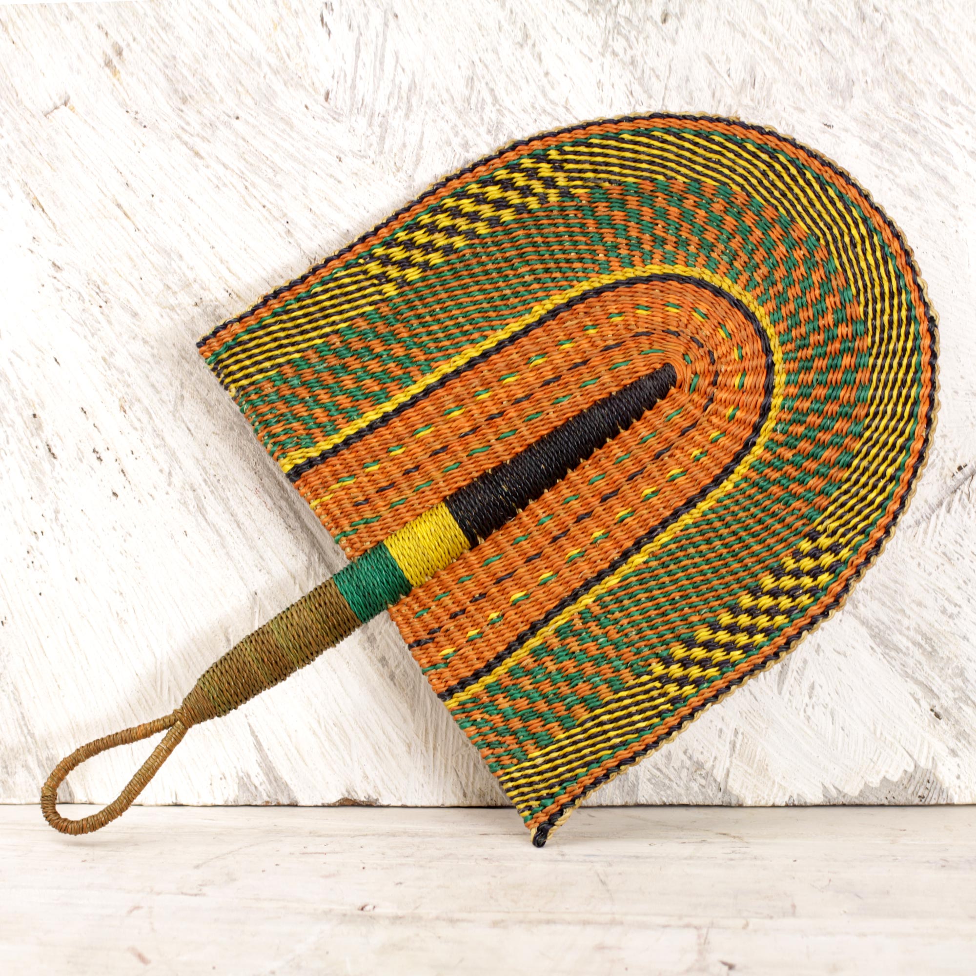 Handwoven Multicolored Raffia Fan from Ghana, 'African Comfort' right sculpture for your home