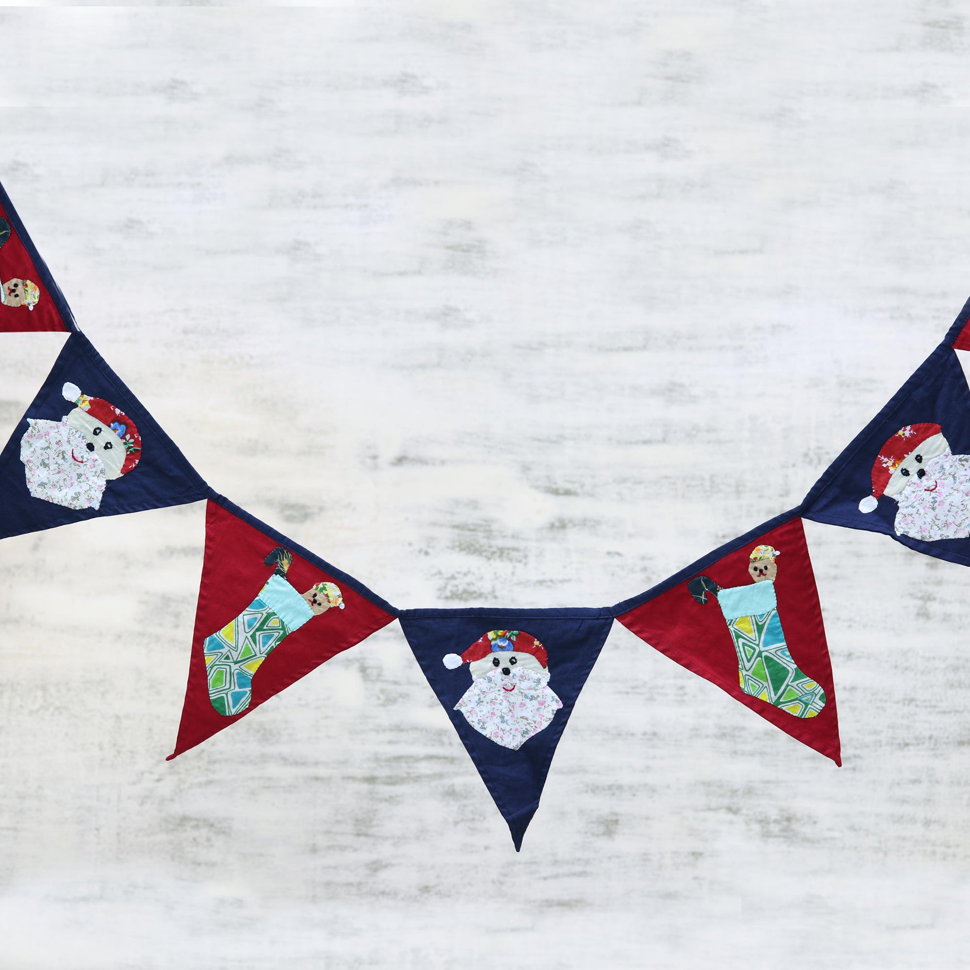 Festive Christmas Red and Navy Cotton Christmas Bunting from India artisan hand crafted Unique Holiday Decor Treasures