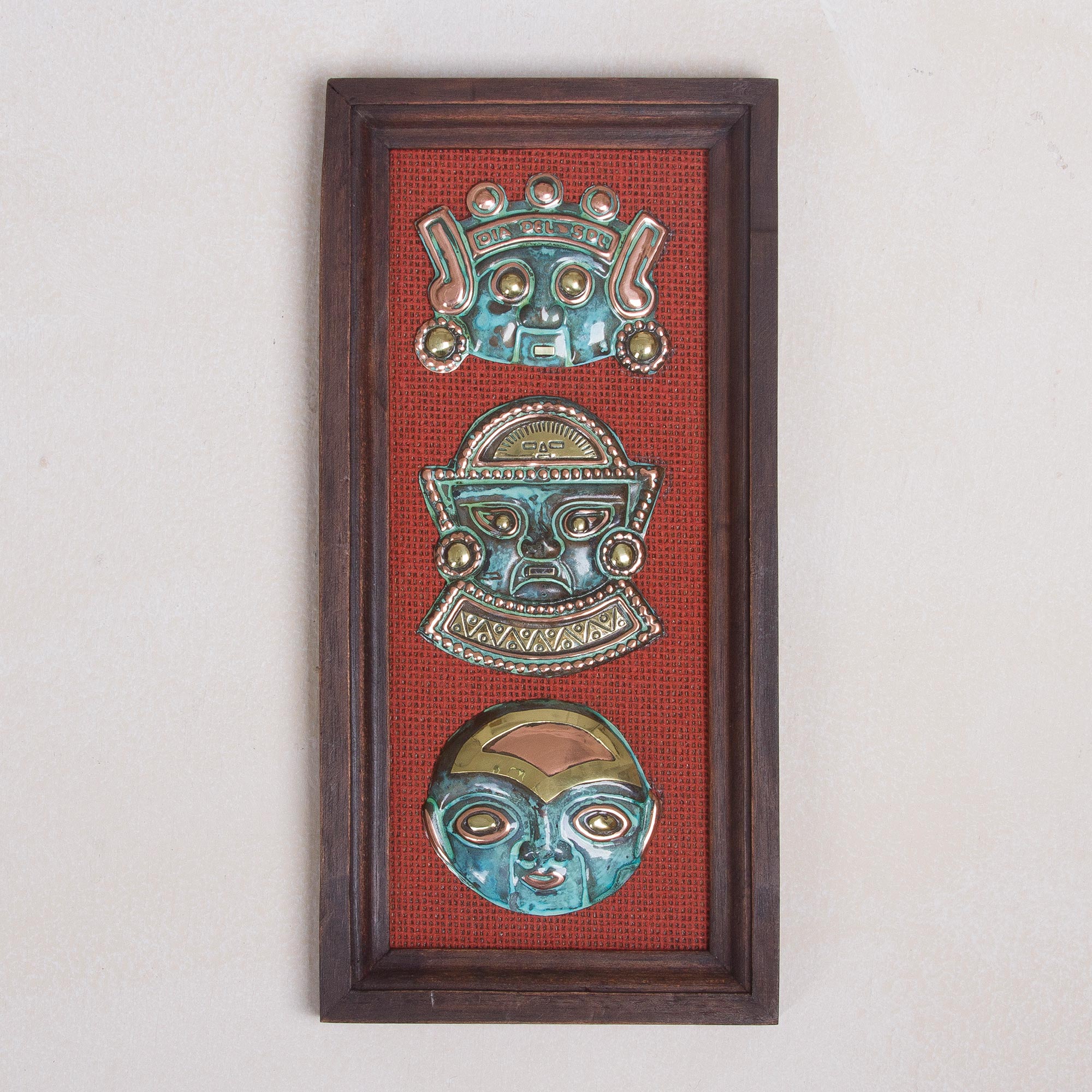 Peruvian Culture Copper and Bronze Wall Sculpture of Ancient Masks from Peru Pairing Area Rugs