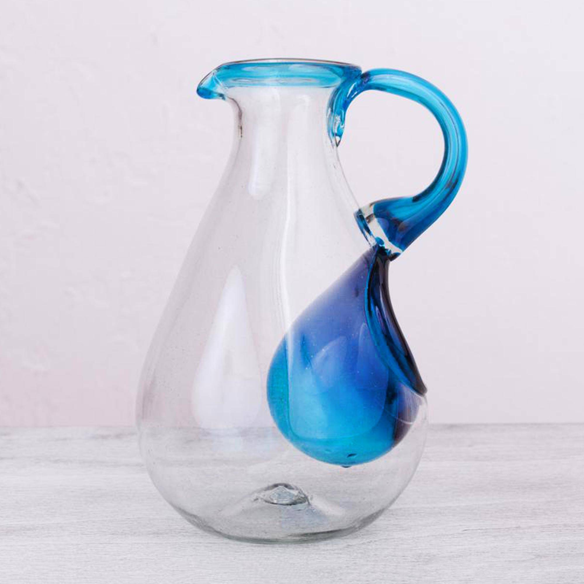 Fresh Caribbean Hand Made Blown Glass Pitcher with Ice Chamber essential glassware for your home bar