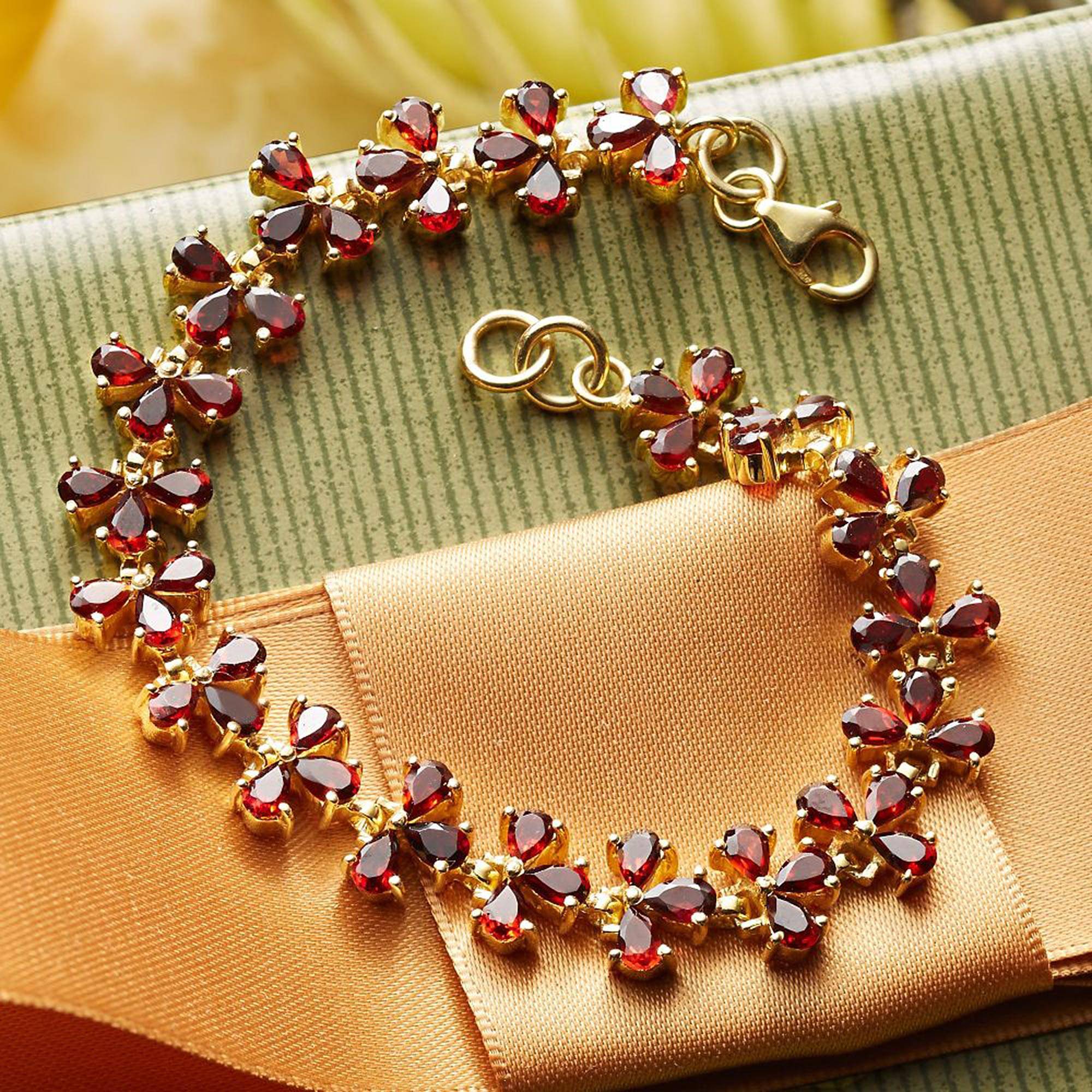 Petals Handcrafted Gold Vermeil and Garnet Bracelet What are birthstones