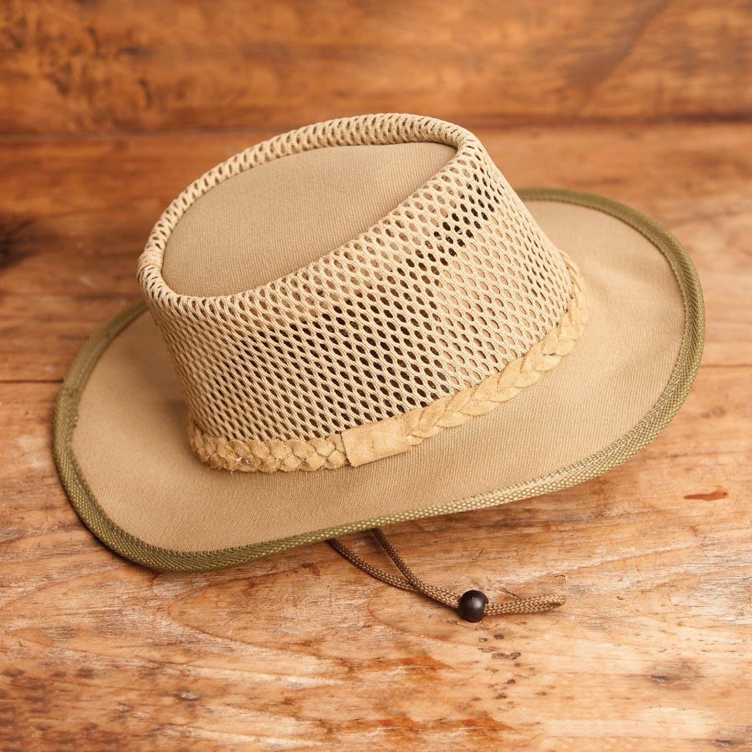 https://www.novica.com/p/mens-ventilated-african-mesh-ranger-hat/327205/